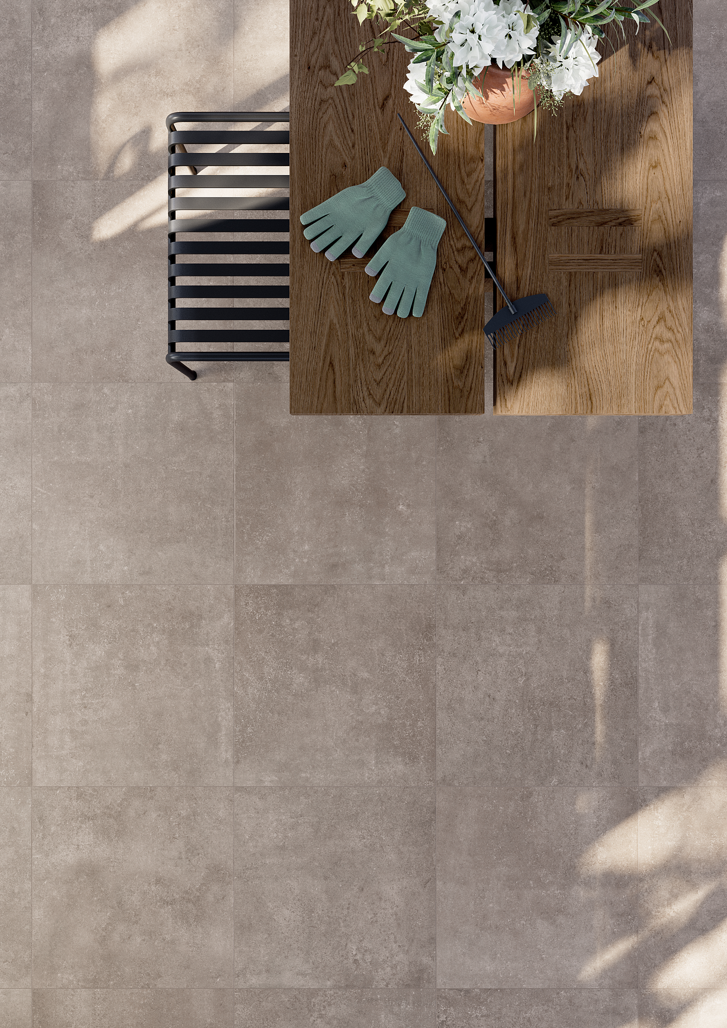 Hochwertige graue Fliesen in Betonoptik für stilvolle Terrassen und Gärten.